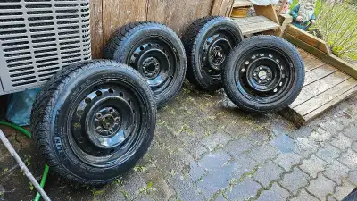 Lightly used Michelin X-Ice Snow Winter Tires with steel rims included. Took off my Honda Civic. Tre...