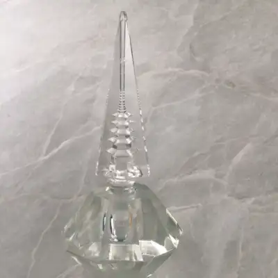 Collectible crystal glass perfume bottle. Picture of Eiffel Tower etched into the top of dabber. Com...