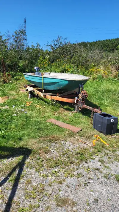 Boat floats,motor works.the trailer is a project I couldn't complete. For more information please ca...