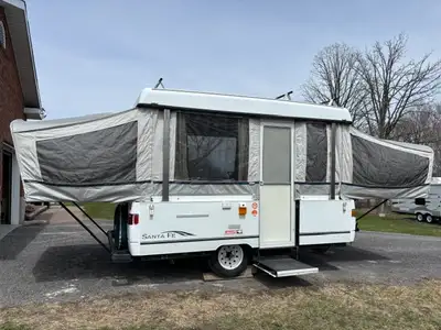 2003 Coleman Santa Fe Pop-Up Camper – Well maintained & ready for camping season! This camper has be...