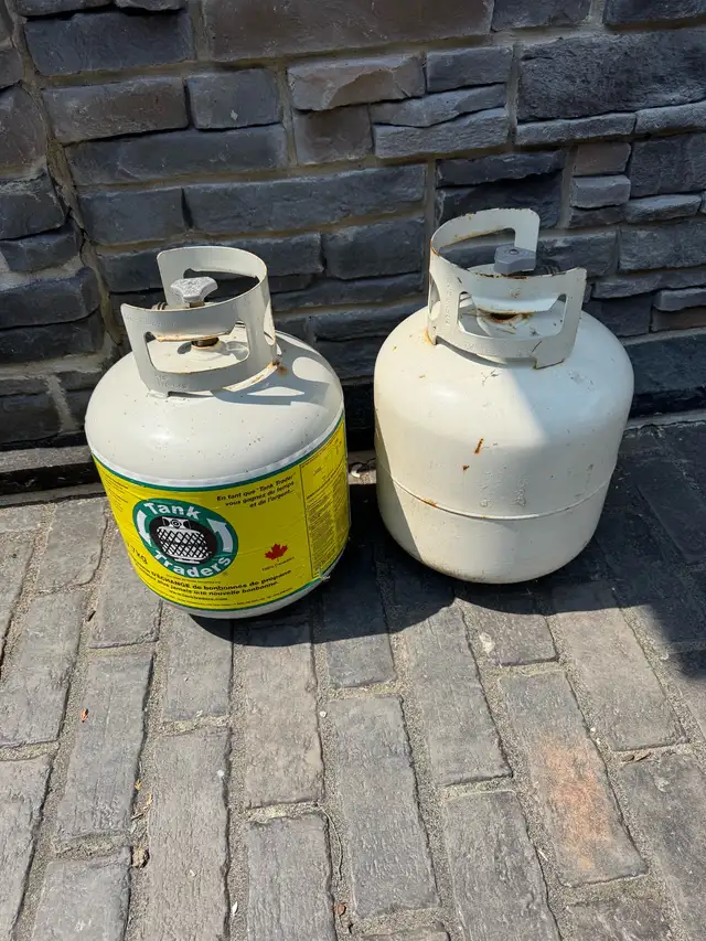 Propane Tank left 1 full  right 1 empty63384461734659121