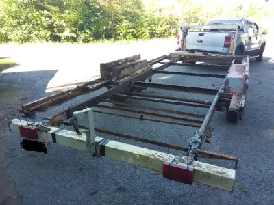 20 feet deck lengh, 67 inches wide, 76 inches between wheels. 2 drop axles with working brakes. 15 i...