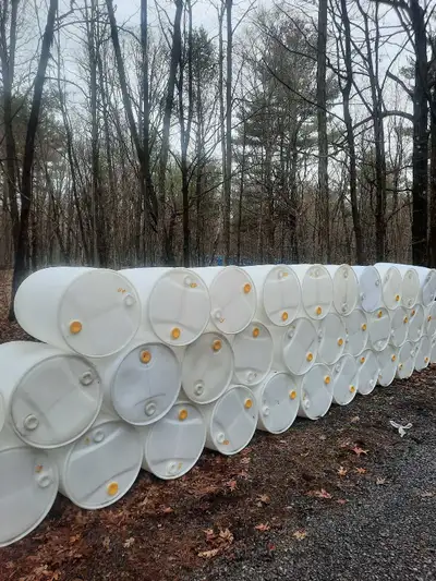 WHITE 45 gallon plastic barrels, View more