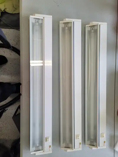 Under cabinet flourescent lights, View more
