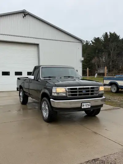 1994 F150 XL 4x4 111,000km The custom paint job is around 6 years old, unfortunately the rear fender...