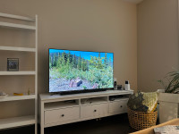 60 inch tv with free white IKEA tv stsnd
