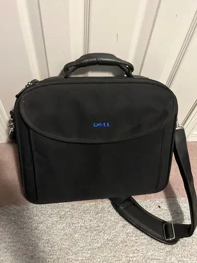 As pictured. Has compartments for accessories.