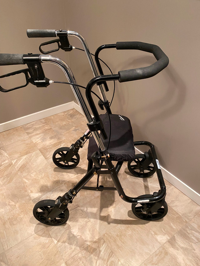 Walker. Foldable with wheels, brakes and basket in Health & Special Needs in Calgary