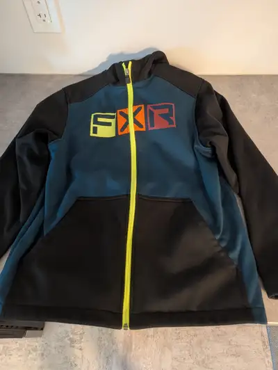 I have a FXR Jacket/Sweater. My kids didn't like the colors. Practically new. Youth Size Large. Aski...