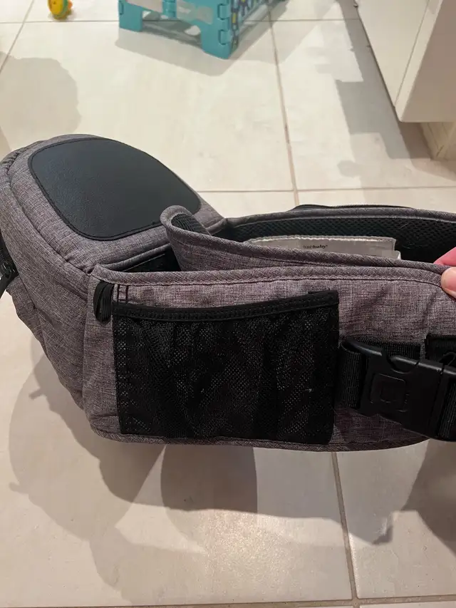 Tush Baby (baby carrier) in Strollers, Carriers & Car Seats in St. Catharines - Image 3