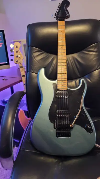 Squier contemporary Strat hh fr in gunmetal for sale. Plays fantastic needs new strings not looking...