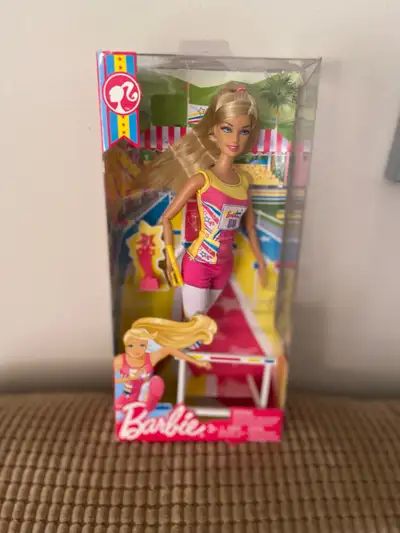 Barbie I can be a Olympic track & field star. Doll by Mattel 2011 # W3768 includes hurdle , relay ba...