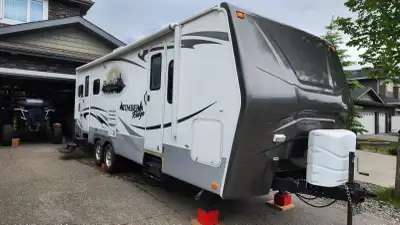 For sale is our 2011 Timber Ridge 250RSL Four Seasons trailer. Went through thr whole Trailer last y...