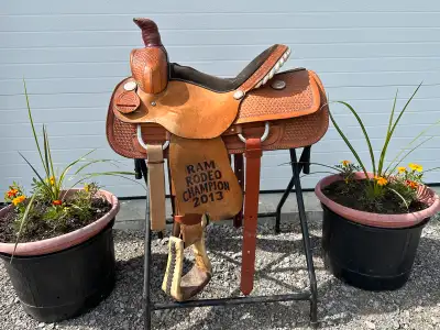 The American western roping saddle Beautiful saddle, very comfortable and sits you nice 15 inch seat...