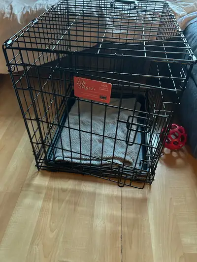 Small dog crate $55, metal foldable, View more