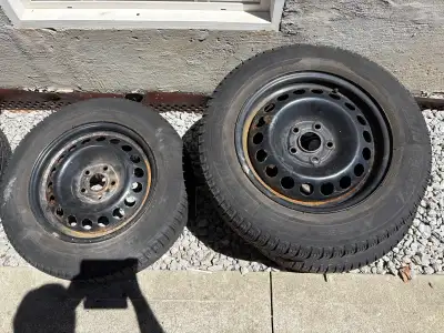 Steel rims and winter tires for Chevy sonic. Decent tread on tires and rims in good condition. Pleas...