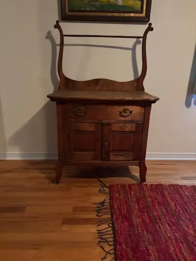 Antique Washstand with a curved harp for towels, etc. In great condition, can be used for storage; h...