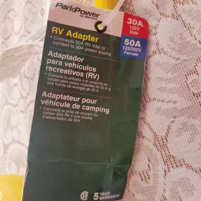 30amp to 50 amp female RV adapter. Didn't need to use it after all. Asking $15