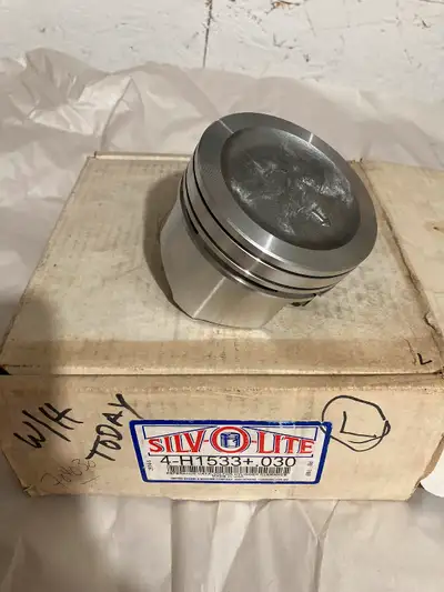 New set of General Motors 2.5 liter four cylinder cast pistons. Many applications including: Pontiac...