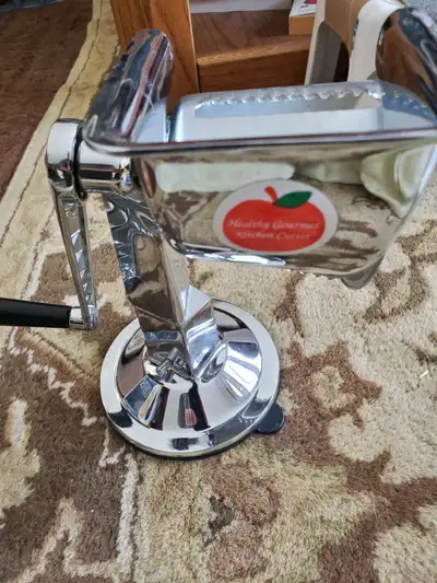 comes with 5 chrome cutters. made in usa. suctions to counter. mint cond. its heavy duty built to la...