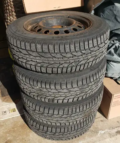 4 Firestone Winterforce 2 winter tires, 195/65 R 15 M+S, mounted on 15 inch 5X114.3 bolt pattern ste...
