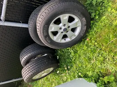 4 all seasons tires tires , installed on 4 Aluminum mags Motomaster , Total Terrain APX , 235-70R16...