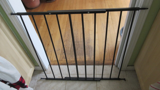 Black metal swing gate suitable for top of stairs in Gates, Monitors & Safety in Ottawa - Image 2
