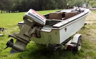 14ft 7inch Crestliner Boat has a 2 stroke 55HP Outboard Johnson motor mixed fuel has spare tire and...