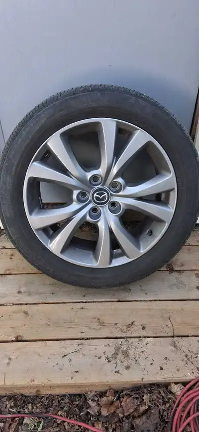 All season tires on Mazda rims 4 Bridgestone Turanza 215/55 R18