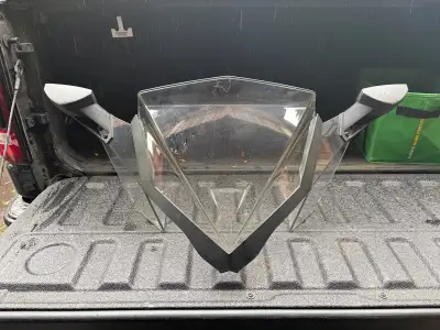 Skidoo Renegade XP high windshield with mirrors. Came off a 2016 XP600 Missing one plastic snap as s...