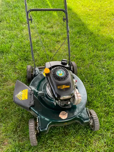 Yard Works 22” gas lawnmower ready to cut grass, View more