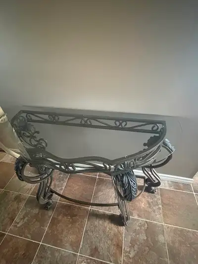 Solid console table 30” tall. Glass is 48”. Minor scratches