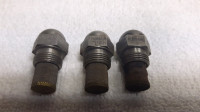 Oil tank injector nozzles