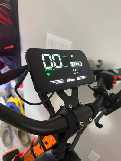 Super fast electric scooter in new condition barely used and stored inside On off road tires Fully d...