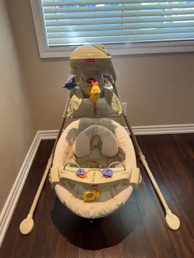 This is a lightly used Fisher-Price Cradle 'n Swing that offers a cozy spot for your baby with gentl...