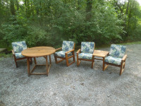 Indoor casual seating set with round table.