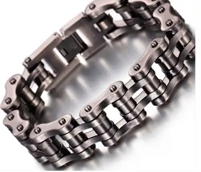 This stylish bracelet features a unique chain design, perfect for adding an edgy touch to any outfit...