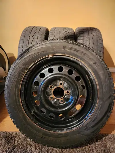 225/55R17 4 winter tires on black steel rims in great shape.Still good for a couple winters. They we...