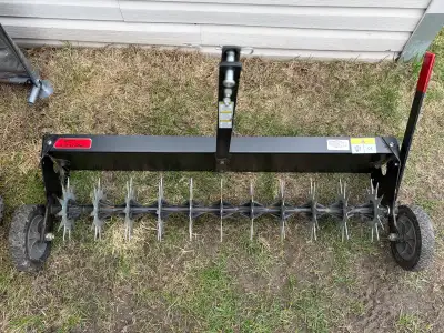 AÉRATEUR À GAZON POUR TRACTEUR COMME NEUF !!!, View more