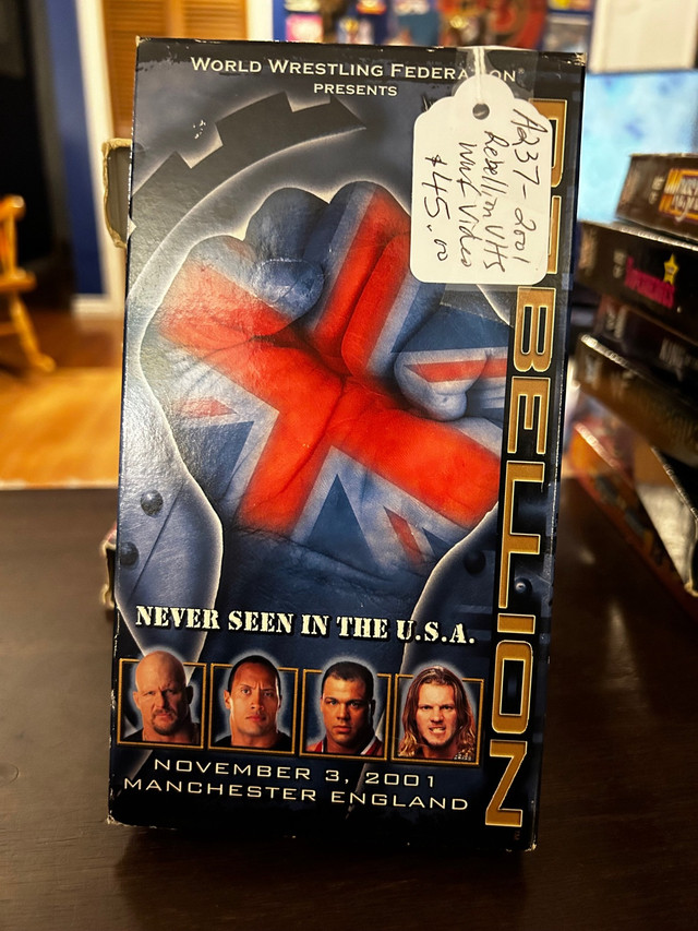 VHS Rebellion WWE WWF 2001 Wrestling Tape Booth 276 in CDs, DVDs & Blu-ray in Edmonton