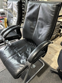 Pair Black Leather Matching Guest / visitor Chairs, sled bottom