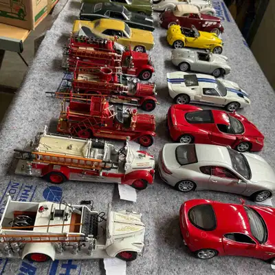 Explore this diverse collection of diecast model cars and fire trucks, perfect for collectors and en...