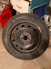 215/55R17 Winter tire like new on 5 nuts steel rim