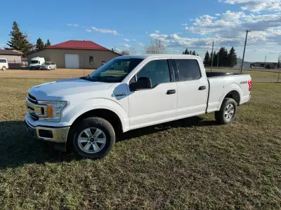 Has cruise control, backup camera, bluetooth, Well functioning four by four, no a/c. Interior in goo...