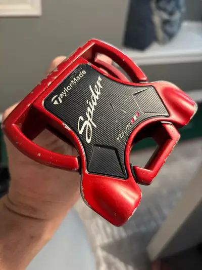 Up for grabs is a used TaylorMade Spider Tour Red Putter, known for its exceptional balance and smoo...