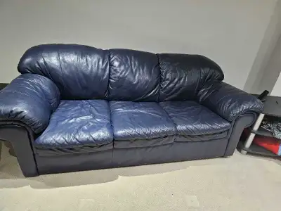 Blue all leather couches no rips or tares, in good shape