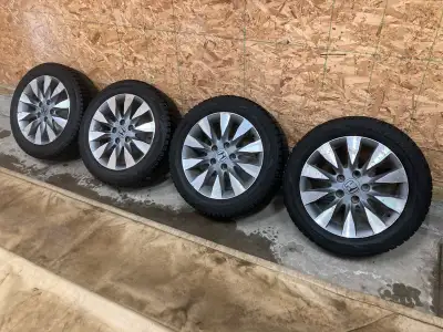 I'm selling a set of four 205 55 R16 studded winter tires mounted on OEM Honda Civic rims, perfect f...