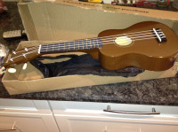 Perfect condition wooden ukulele for sale