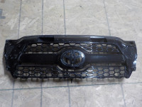TOYOTA TACOMA FRONT BUMPER GRILL