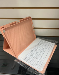 Wireless keyboard case for iPads in coral pink